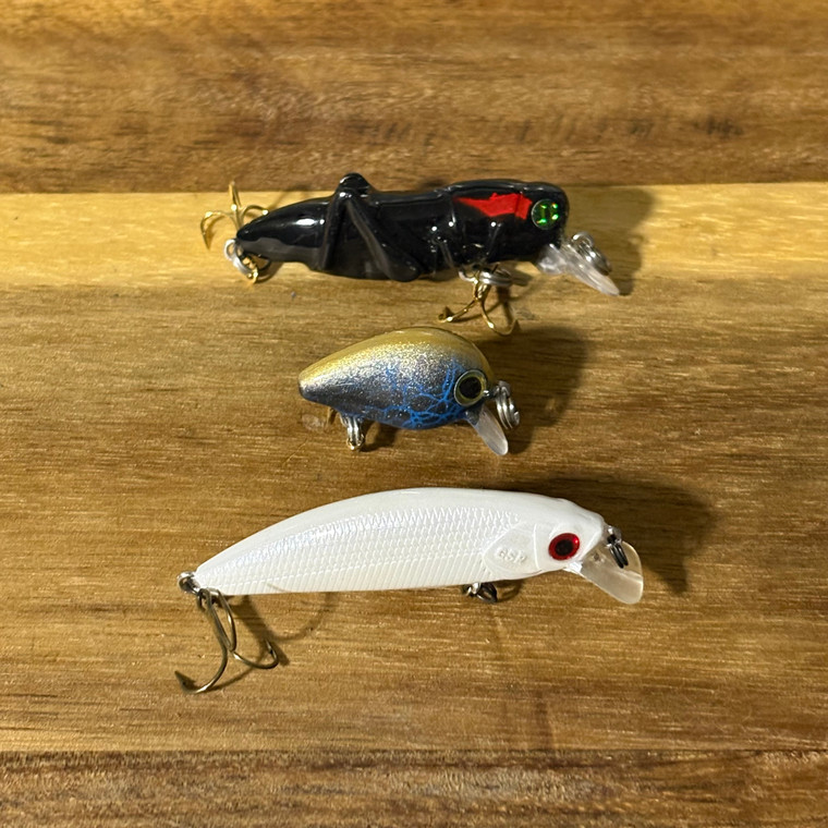 Blind Squirrel Baits creek fishing crankbait trio. Cricket, baby bug, and minnow style hard baits.