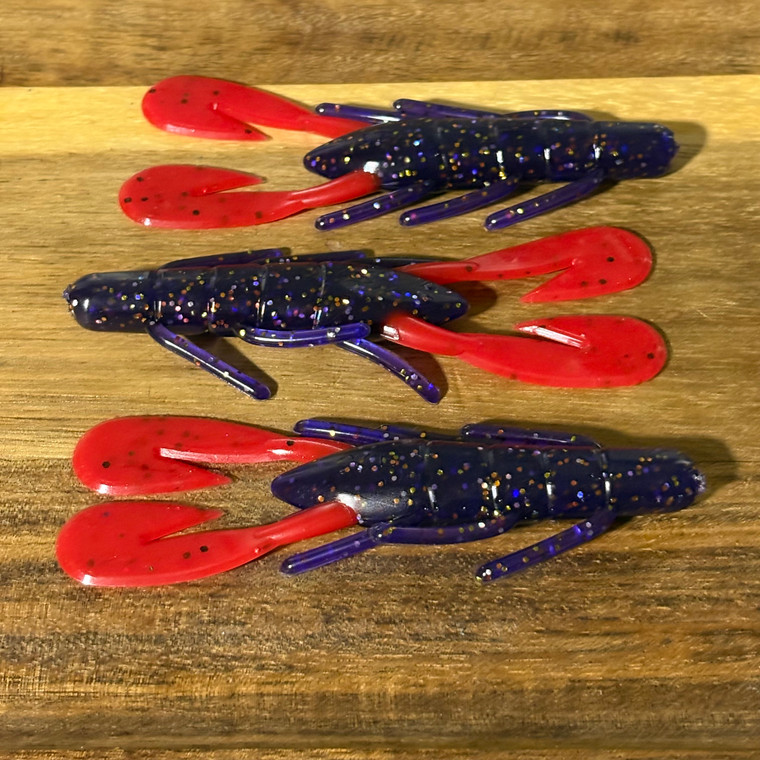 4.5 inch country craws in a hot junebug color with fire red claws