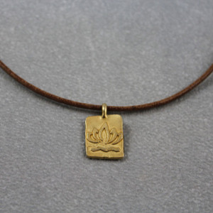 Lotus pendant on leather cord