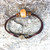 Peace Bracelet with Opaque Amber Focal, Fiber Cord, Glass and Metal Accents