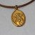 Mary Medal in Gold on Brown Leather