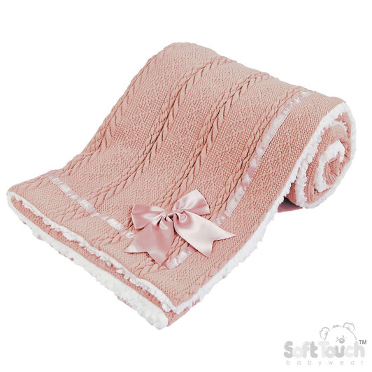 A soft and elegant ROSEGOLD  baby blanket featuring a textured knit design and a plush sherpa-style backing for extra warmth and comfort. Finished with a delicate satin bow, it’s perfect for keeping baby cozy at home or on the go.