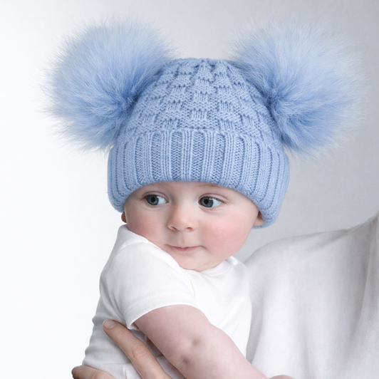 A deluxe baby blue knitted hat featuring a stylish checked and striped design with a 7.5 cm ribbed turnover for a snug, comfortable fit. Finished with two soft, fluffy pom poms for a cute and playful look. Suitable for newborns up to 12 months.
Composition: Hat – 100% acrylic, Pom poms – 100% polyester.
Pack: 1 piece with hook & hang tag label, 6 pieces per polybag.