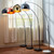 Arquer 66.93" Arc Floor Lamp for Living Rooms, Home Offices, Dining Rooms, Bedrooms with Faux Black Marble Base and Black Bell Shade