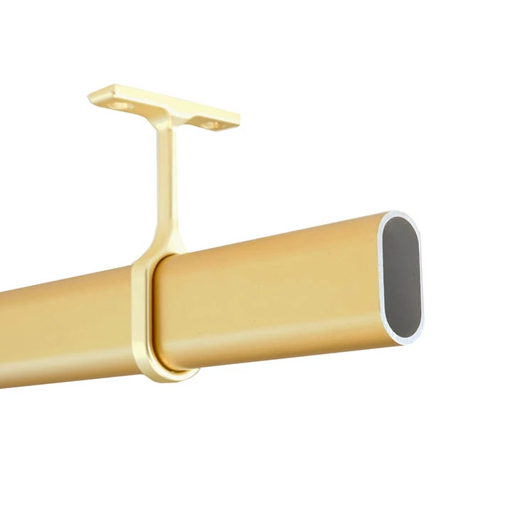 Oval aluminum closet rod in gold anodized with a center support