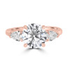 rose gold three stone diamond engagement ring round with pear sides