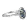 Oval Greenish Blue Bicolor Sapphire Engagement Ring with diamond halo -side view