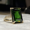 Large Green Tourmaline Ring on gray background