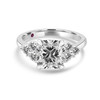 Cushion Diamond Engagement Ring Flanked by Brilliant Cut Diamonds 