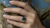 Teal Cushion Sapphire with Marquise Diamonds on hand
