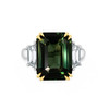 Emerald Cut Green Sapphire flanked by diamond trapezoids