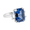 Emerald cut  blue sapphire three stone ring side view