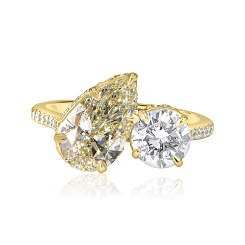 Toi et Moi Diamond Engagement Ring with a pear and round diamond pave band in yellow gold