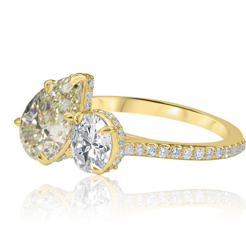 Toi et Moi Diamond Engagement Ring with a pear and round diamond pave band in yellow gold side view