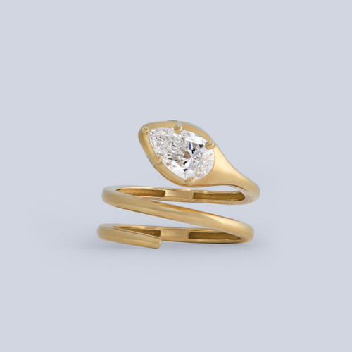 14k yellow gold snake ring with a pear shaped LAB GROWN diamond and two brilliant cut lab grown diamonds totaling 1.50 carats, E/F-VS 14k yellow gold snake ring with a pear shaped LAB GROWN diamond and two brilliant cut lab grown diamonds totaling 1.50 carats, E/F-VS