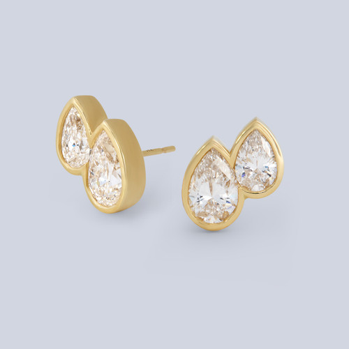14k yellow gold Toi et Moi studs with 4 LAB GROWN pear shaped diamonds, side view