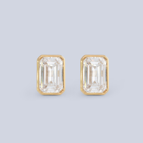 14k yellow gold small studs with 2 LAB GROWN emerald cut diamonds, bezel set, totaling 1.50 carats - front view 14k yellow gold small studs with 2 LAB GROWN emerald cut diamonds, bezel set, totaling 1.50 carats - front view