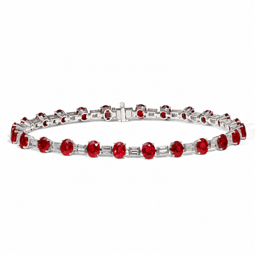 Oval Ruby and Baguette Diamond Bracelet in White Gold