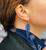 Sapphire Feather Earrings with Blue Rhodium Finish on Model