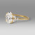 with Oval Cut center flanked by one round and two marquise diamonds on each side - side view