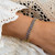 Blue Sapphire Floral Bracelet on model
