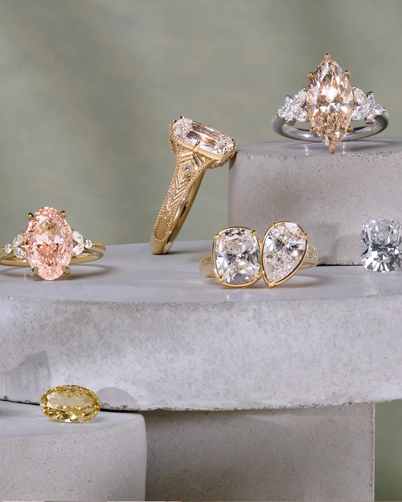 Custom collection of natural and lab grown engagement rings and loose stones