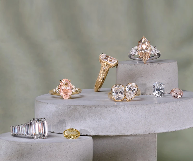 Custom collection of natural and lab grown engagement rings and loose stones
