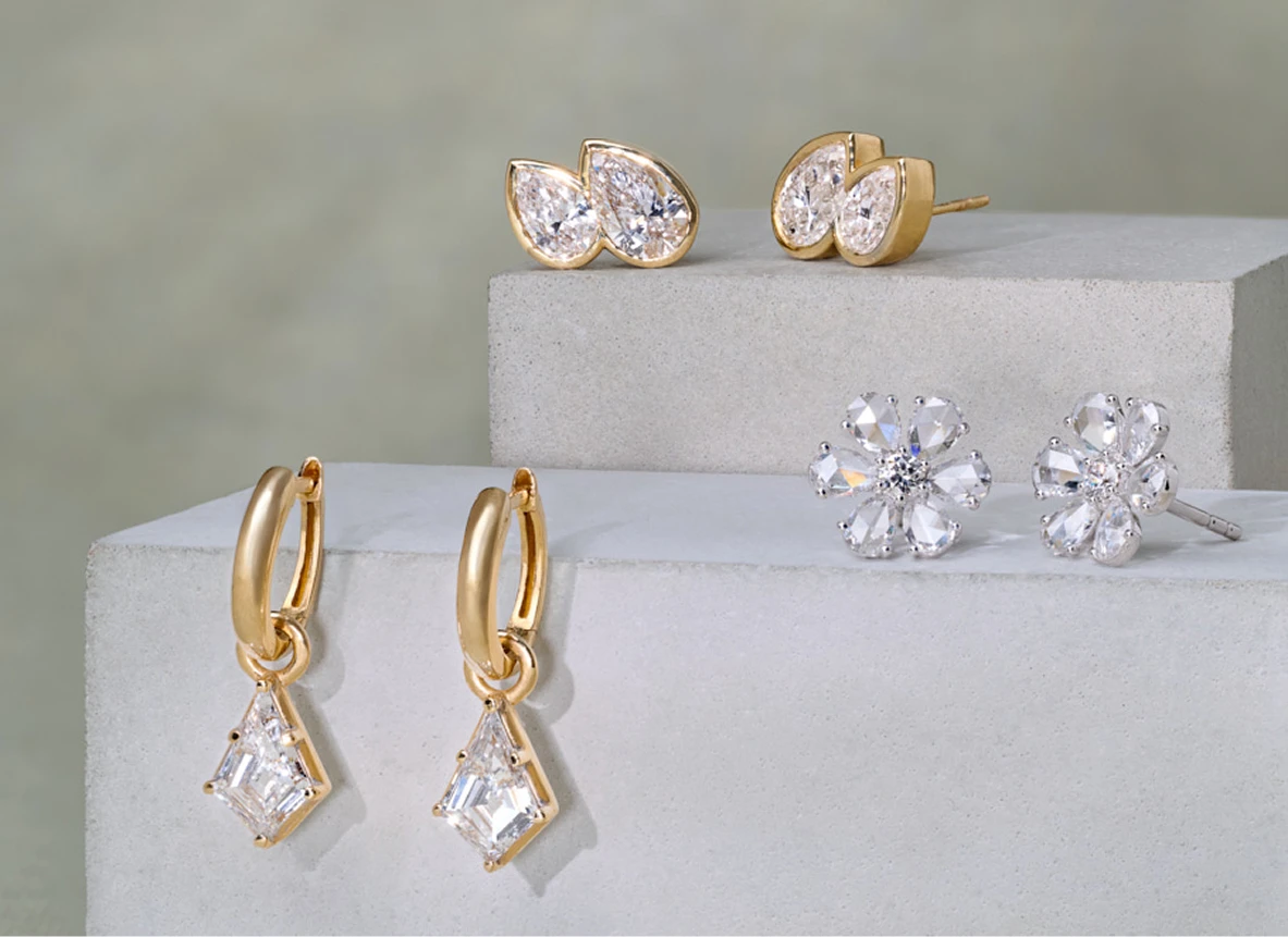 Three pairs of lab grown diamond earrings