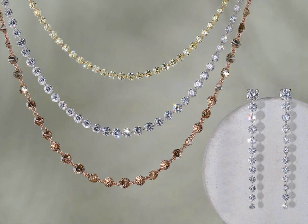 Floating drilled diamond necklaces and earrings 
