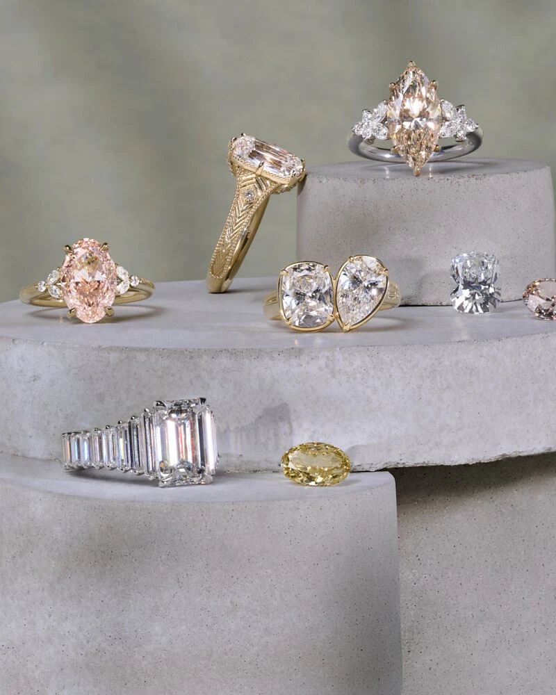 Custom collection of natural and lab grown engagement rings and loose stones