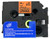 Open Box 1-1/2" black on Fluorescent orange label tape tape
