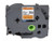 Genuine Brother TZe-B51 fluorescent orange label tape 1-inch wide with bold black text for safety and warning labels