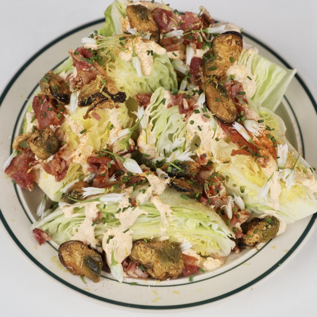 Buffalo Wedge Salad with Smoked Mussels Buffalo Wedge Salad with Smoked Mussels