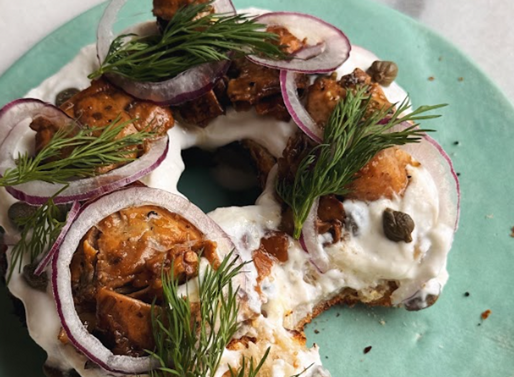 A Loaded Toasted Bagel with Lemon Pepper Oysters  A Loaded Toasted Bagel with Lemon Pepper Oysters