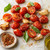 Fresh tomato basil mozzarella salad with olive oil, garlic, herbs, and Tomato Basil Garlic seasoning inspiration for caprese-style dishes.