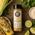 Top view of Milford Spice Company Street Corn seasoning with corn kernels, grilled corn, lime, cilantro, and creamy sauce ingredients on a wooden background.