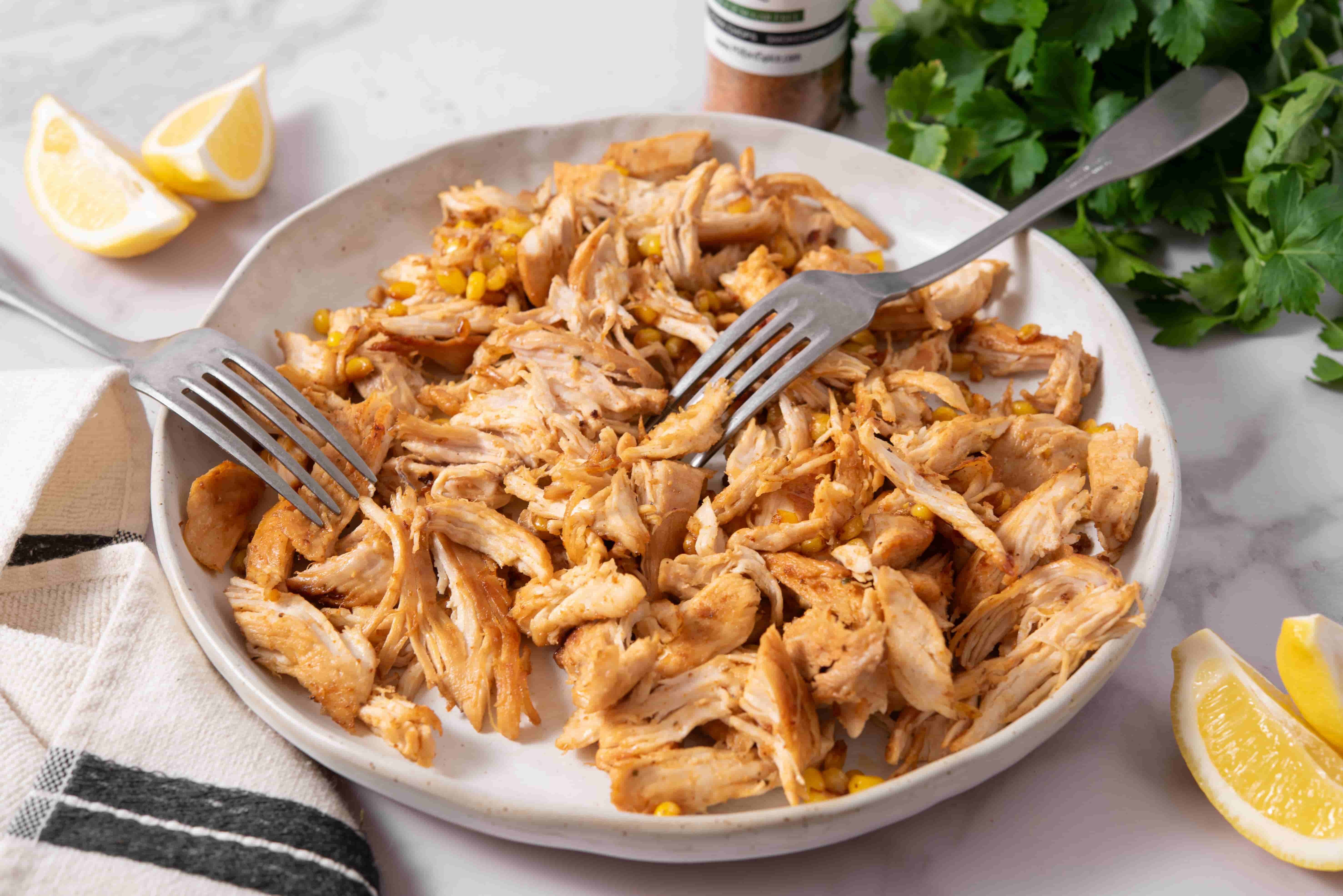 Shredded BBQ chicken with sweet corn ready for filling whole-wheat tortilla folds