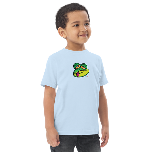 Toddler in light blue t-shirt featuring an original illustration of a frog