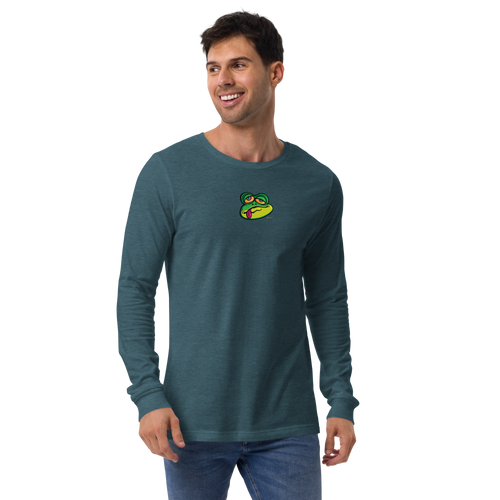 Toothy guy wearing a teal, long sleeve shirt featuring an original illustration of a crazed frog who also looks disturbingly hungry