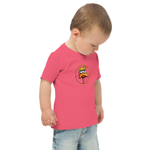 Toddler in hot pink t-shirt (and looking none-too-happy about that) featuring an original illustration of a duck