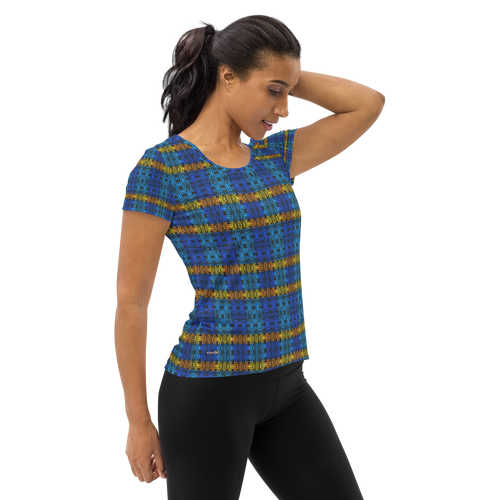 Woman in blue & gold athletic t-shirt featuring an abstract stripe pattern (side view)