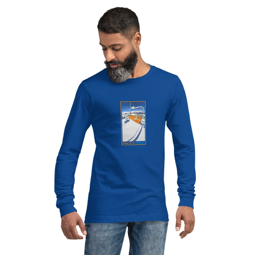 Beardy guy wearing a royal blue, long sleeve T-shirt featuring an illustration of a Labrador puppy riding a ski chair lift