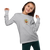 Kid wearing a gray, long-sleeved tee featuring an illustration of a duck