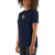 Woman wearing jeans and a navy blue t-shirt that features an original illustration of a duck