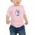 Baby in a pink, short sleeve tee featuring an original illustration of a quail