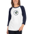 Woman missing half her head wears a white and navy blue, raglan sleeve baseball shirt featuring an original illustration of a mouse