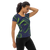 Woman in navy blue athletic t-shirt featuring bright green abstract print (side view)
