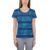 Woman in athletic tee shirt featuring blue abstract stripe print (front view)