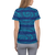 Woman in athletic tee shirt featuring blue abstract stripe print (back view)