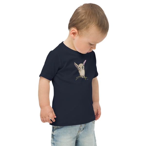 Toddler in a navy blue, short sleeve tee featuring an original illustration of a sheep / goat / kangaroo?